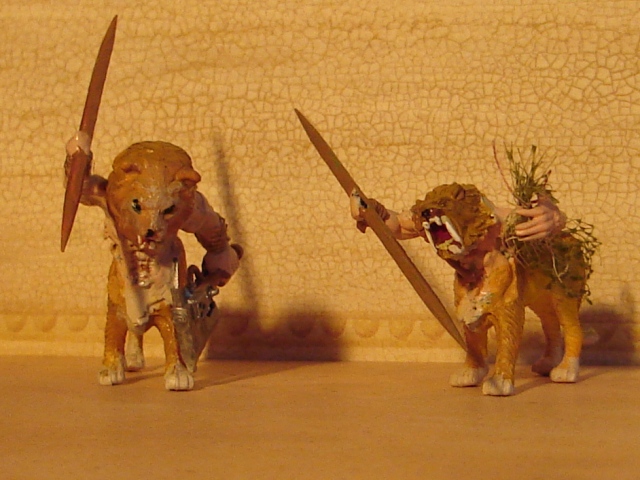 Shoving a torso between a cat head and cat body.